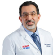 Michael Dominguez, MD at HealthTexas in white lab coat