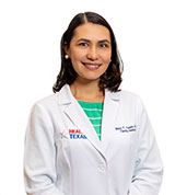 Mary Casiwa MD at Health Texas in white lab coat