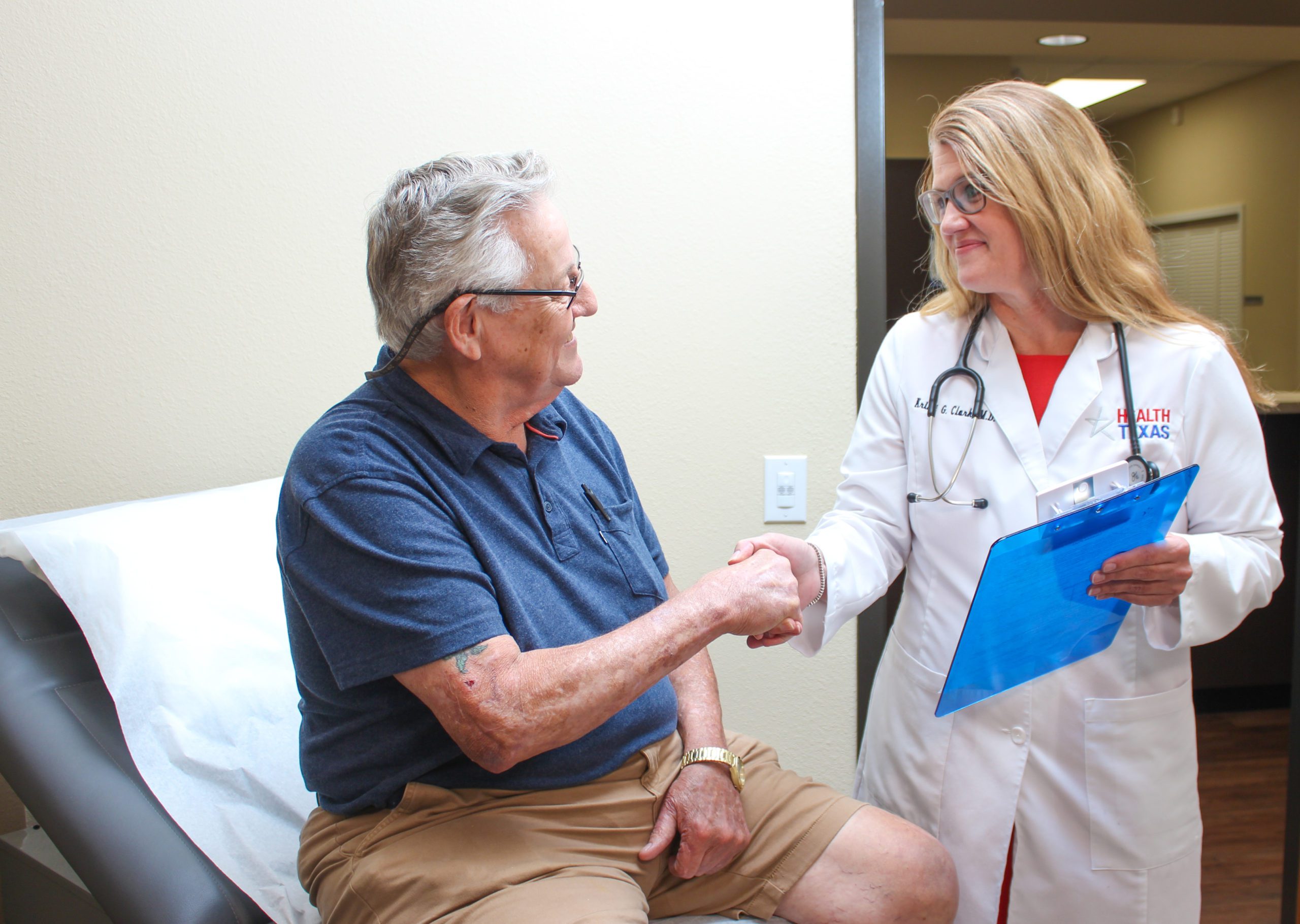 HealthTexas doctor shaking hands with patient