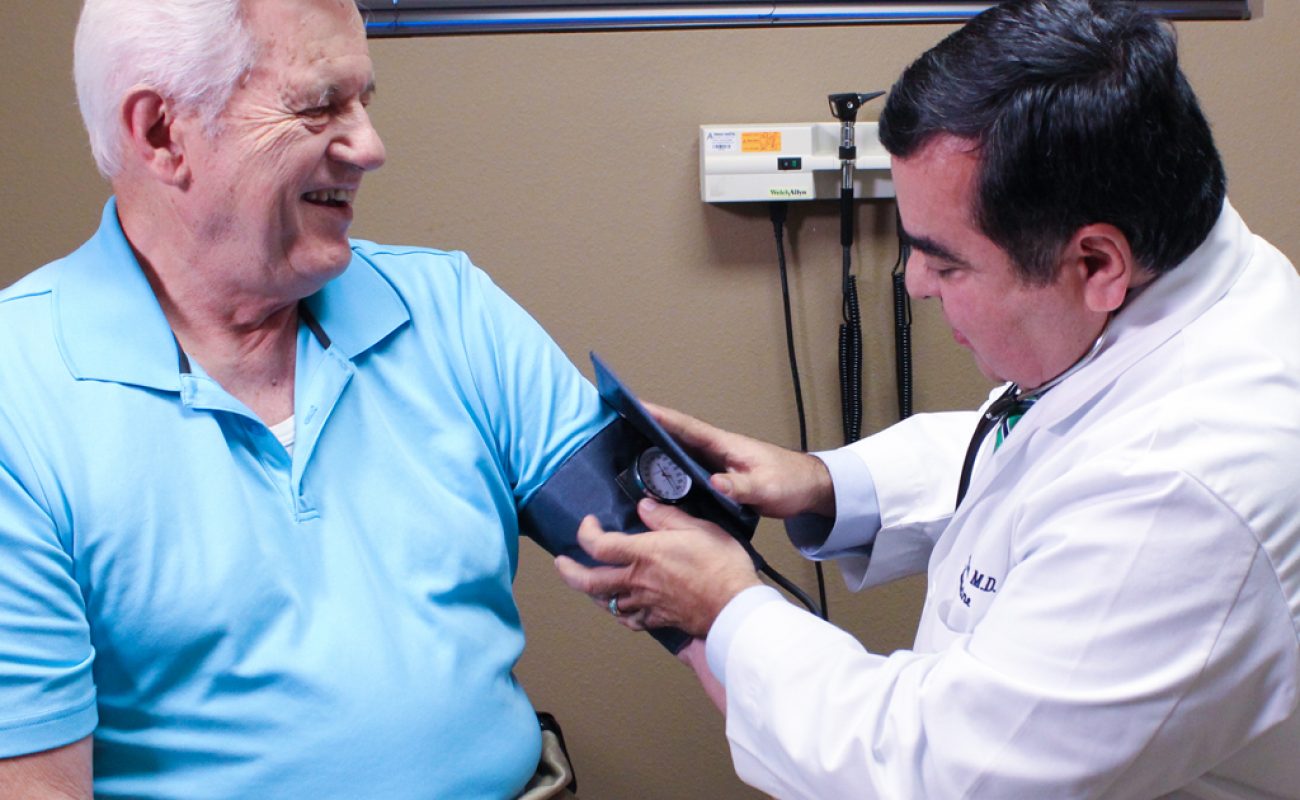Doctor Checking Vitals from a Patient